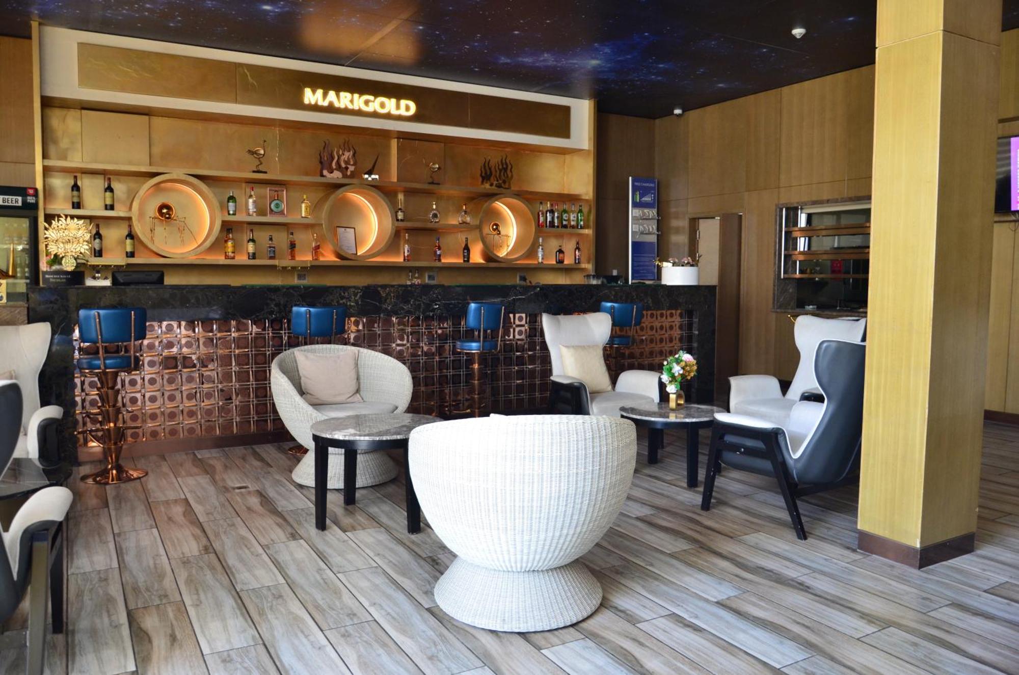 Marigold Hotel & Restaurants Віндгук Екстер'єр фото